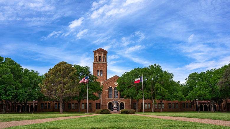 Hardin Administration building with a nice daytime view of the yard in front